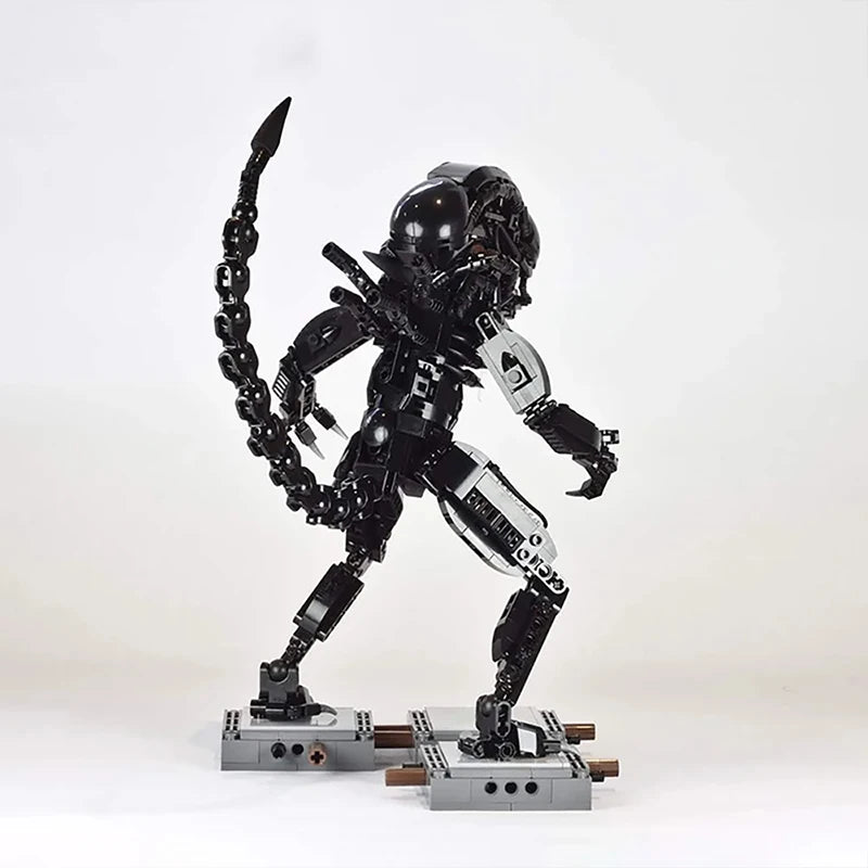 MOC Alien Mech Building Block Set inspired by the Xenomorph from Alien Vs. Predator, featuring a detailed and terrifying design, perfect for sci-fi and horror fans, collectors, and creative builders.