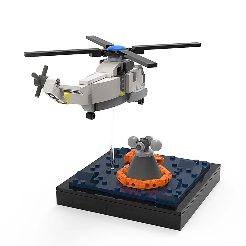 Rescue Helicopter Building Block Model featuring a detailed white helicopter with a winch lowering a rescue buoy, displayed on a black base, perfect for aviation and rescue operation enthusiasts