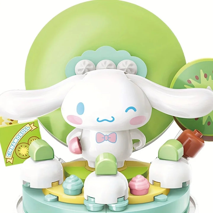 Sanrio Cinnamoroll Cartoon Cake Building Blocks Set featuring a cute anime figure of Cinnamoroll on a colorful cake, ideal for kids' toys, desktop ornaments, and birthday gifts.