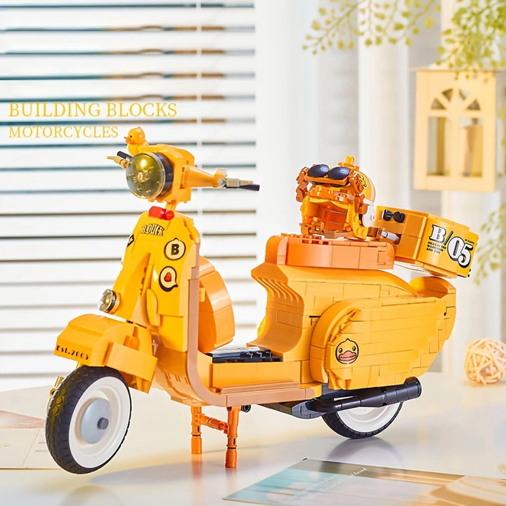 Yellow Duck Motorcycle Building Blocks Set featuring a travel motorcycle with helmet and trunk box, perfect for kids who love building and adventure.