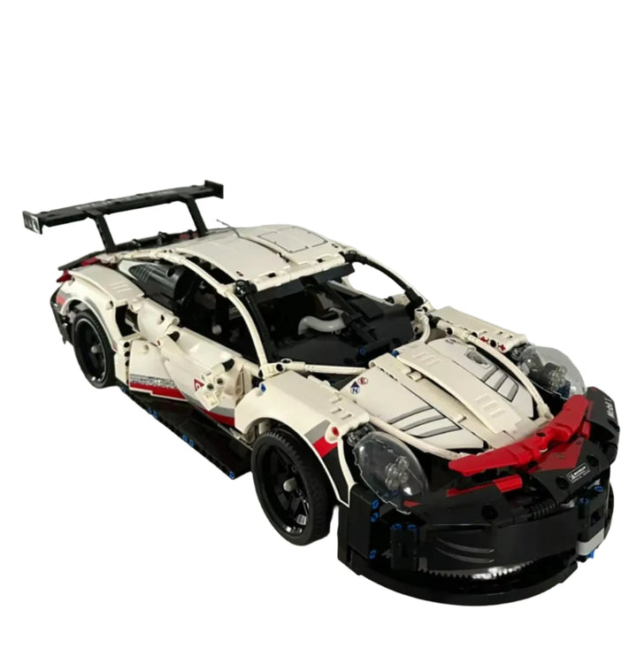 A highly detailed 2003-piece Speed Car Building Blocks Technology Super Sports Car Model featuring sleek aerodynamic lines, realistic cockpit, and engine bay, perfect for car enthusiasts and collectors.