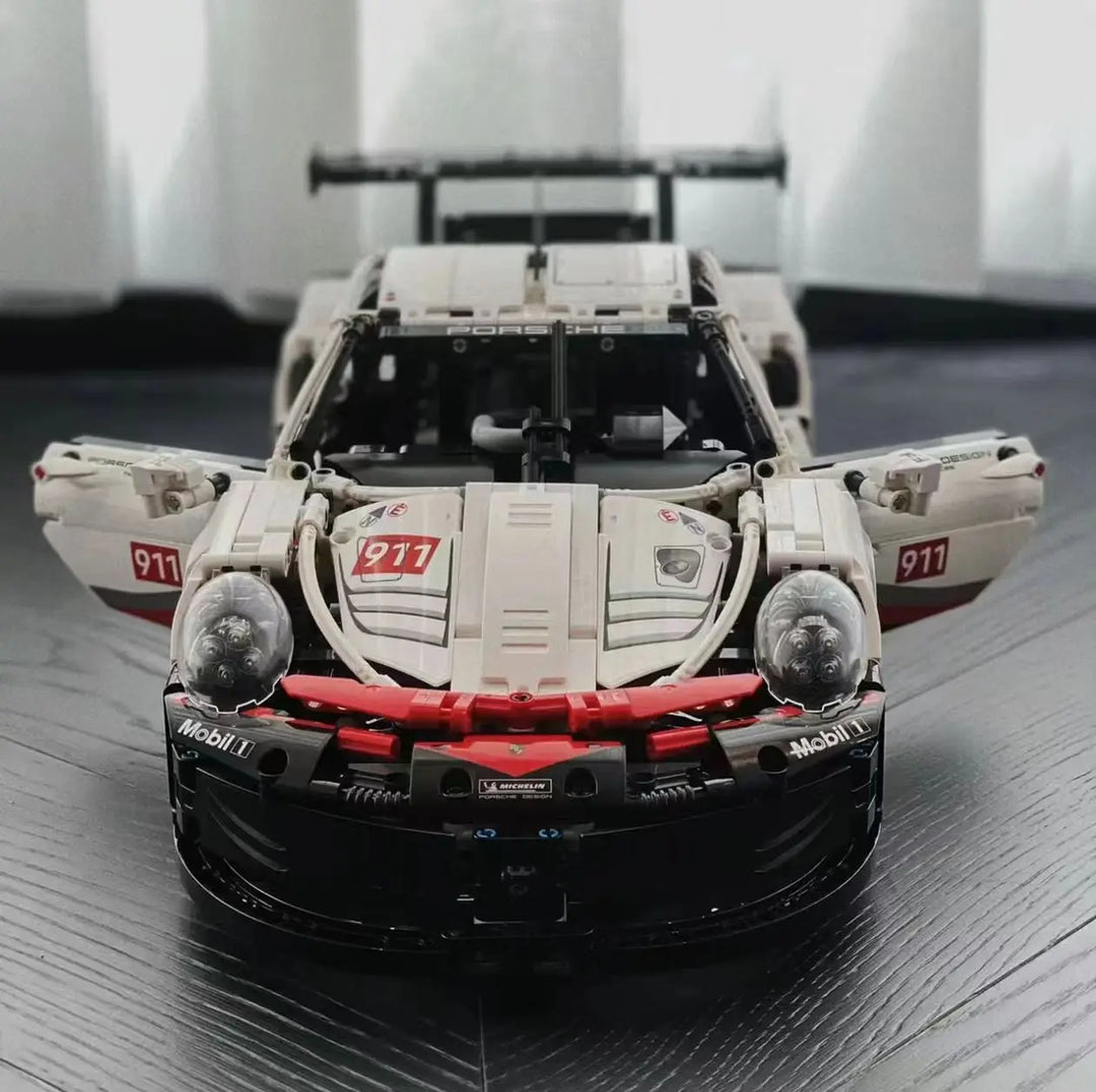 A highly detailed 2003-piece Speed Car Building Blocks Technology Super Sports Car Model featuring sleek aerodynamic lines, realistic cockpit, and engine bay, perfect for car enthusiasts and collectors.